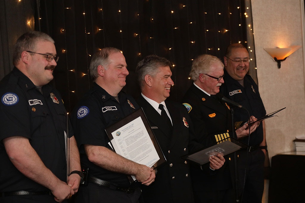 May contain: military, military uniform, person, human, officer, tie, accessories, accessory, captain, suit, clothing, coat, overcoat, and apparel