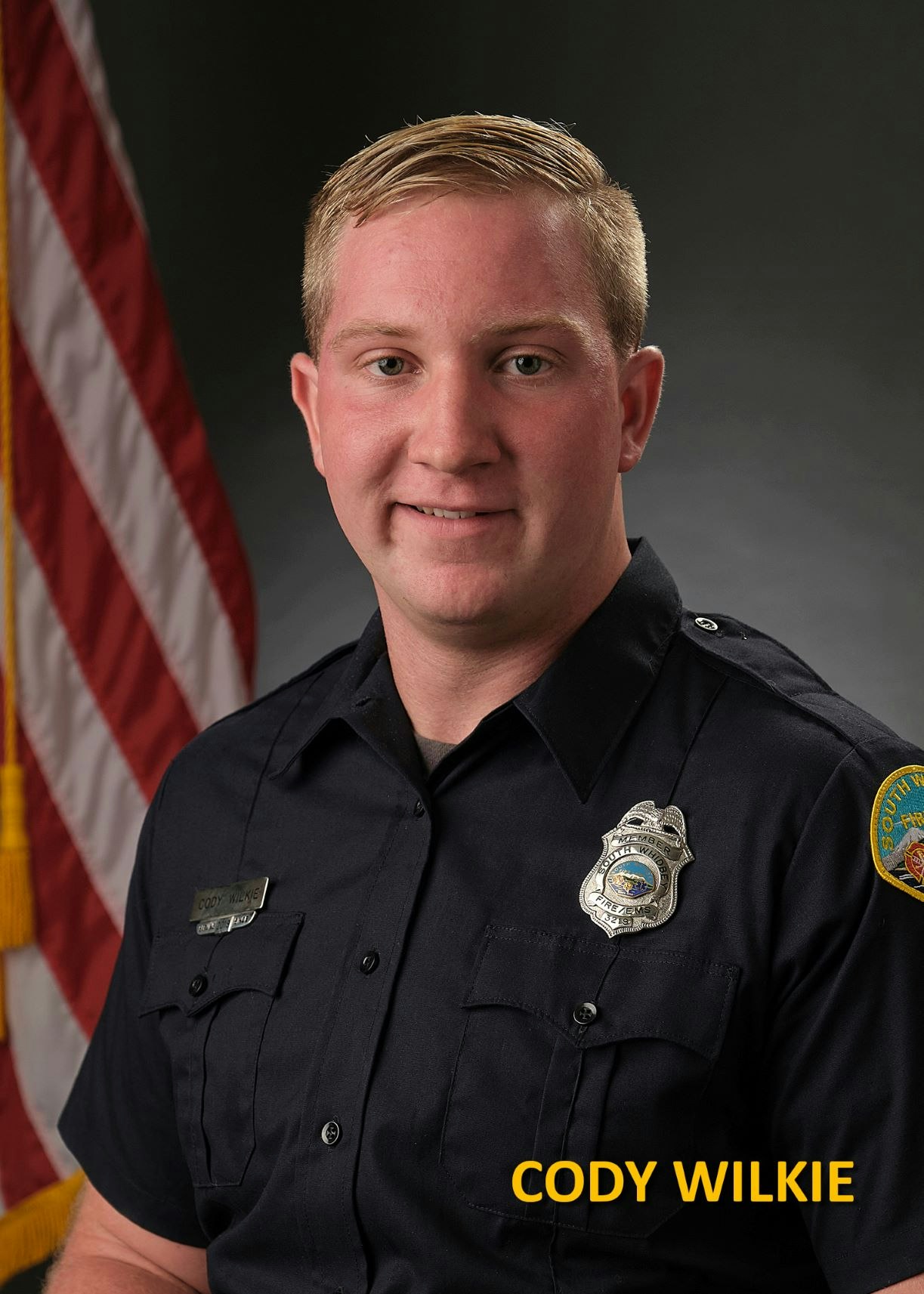 May contain: officer, military uniform, military, person, human, captain, symbol, and flag