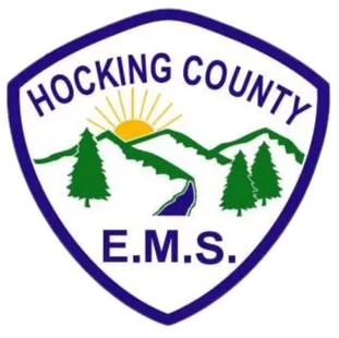 Hocking County E.M.S. logo with mountains, trees, and a sunrise.