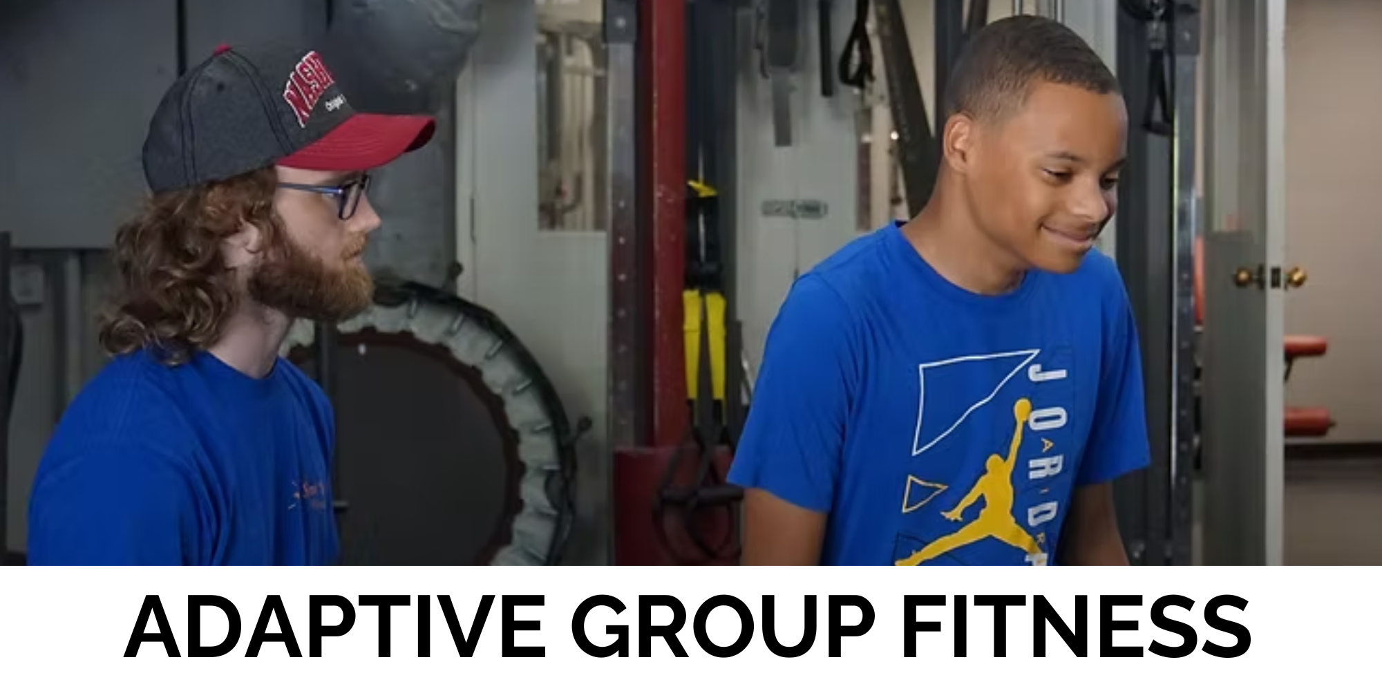 Two people in a gym, one wearing a hat and glasses, with text "ADAPTIVE GROUP FITNESS" below.