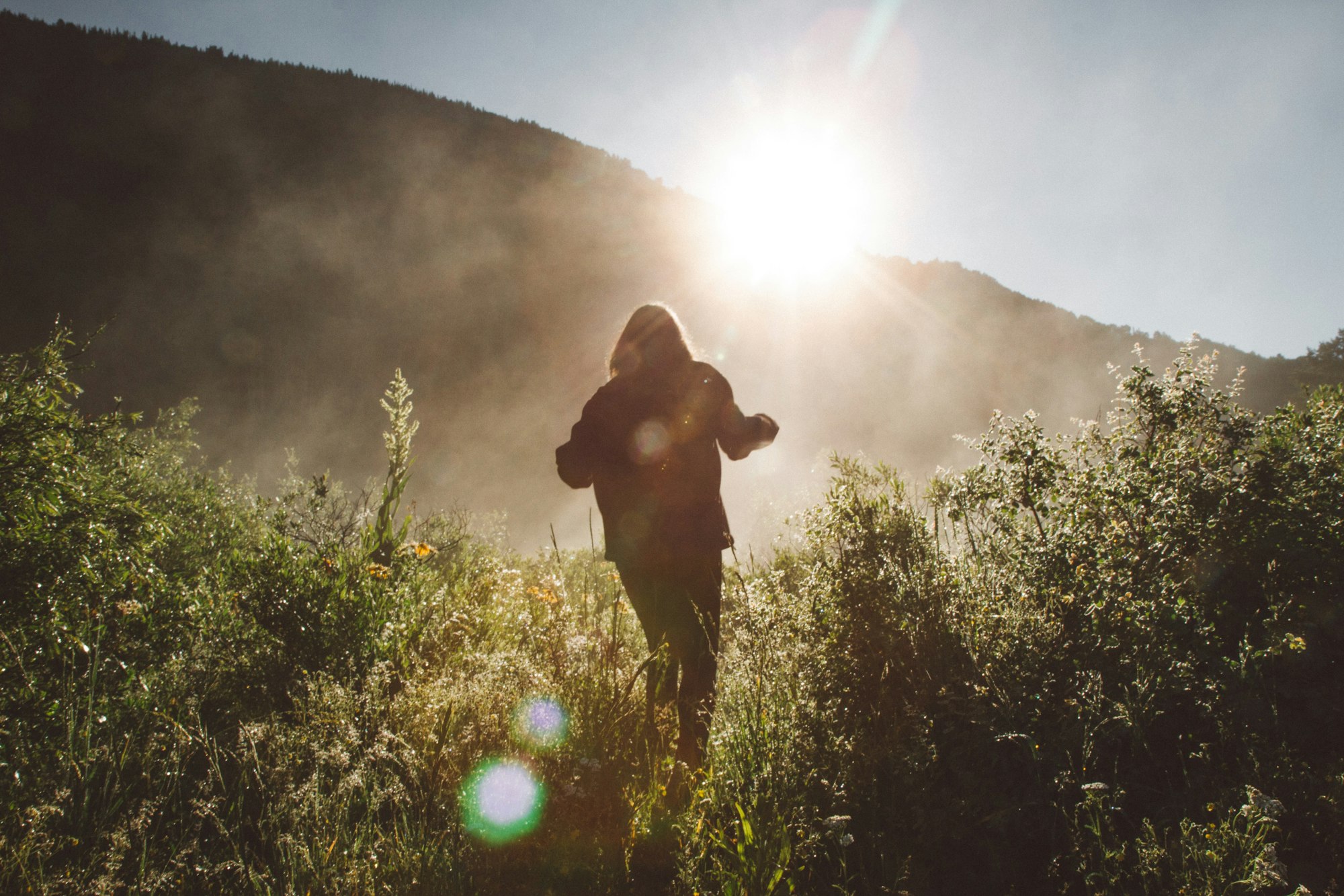 May contain: photography, flare, light, sunlight, person, and outdoors