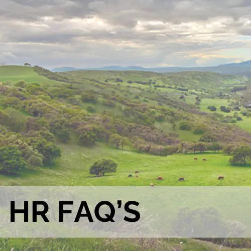 A scenic landscape with text overlay "HR FAQ's" indicating human resources frequently asked questions.