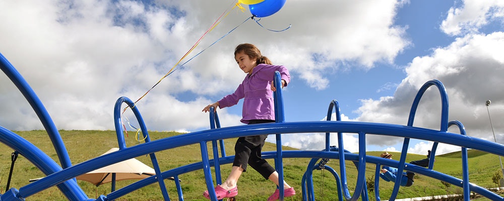 May contain: person, child, girl, female, outdoors, play area, and outdoor play area