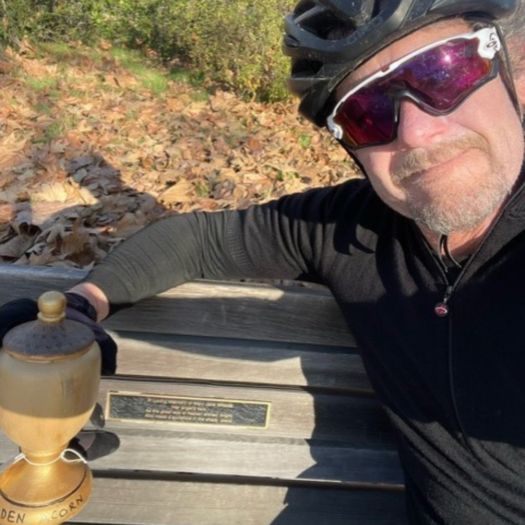 May contain: accessories, sunglasses, face, head, person, photography, portrait, glasses, adult, male, man, pottery, helmet, clothing, t-shirt, bench, furniture, and rock