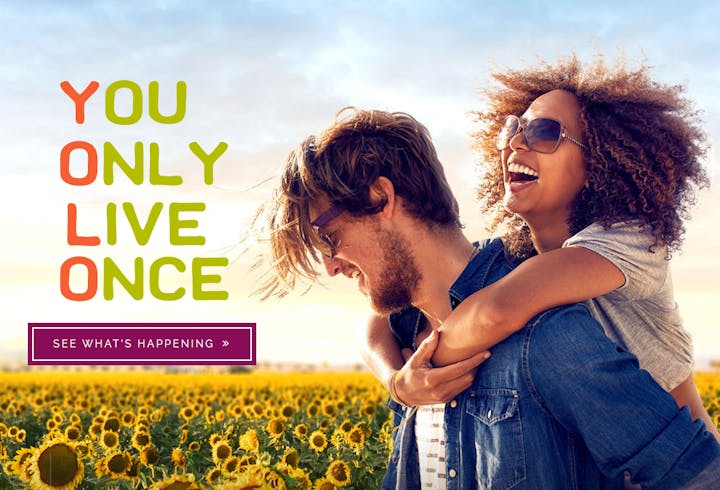 May contain: accessories, sunglasses, photography, face, head, person, portrait, adult, female, woman, flower, plant, happy, clothing, jeans, and pants