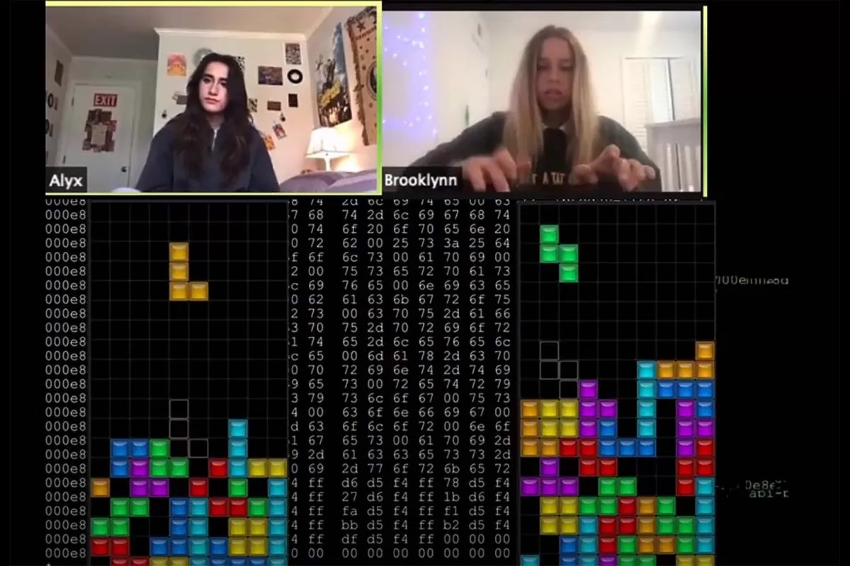 Two people in a video call playing Tetris on a split screen.