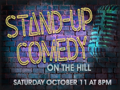 Neon text on brick wall: "Stand-Up Comedy on the Hill, Saturday October 11 at 8PM" with a microphone graphic.