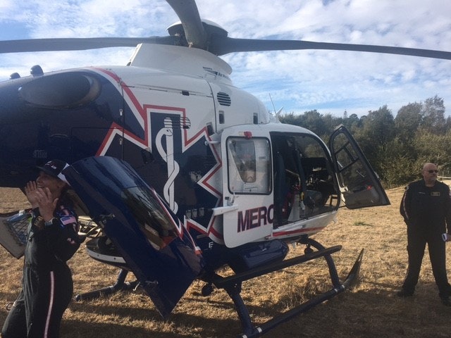 May contain: vehicle, aircraft, transportation, helicopter, person, and human