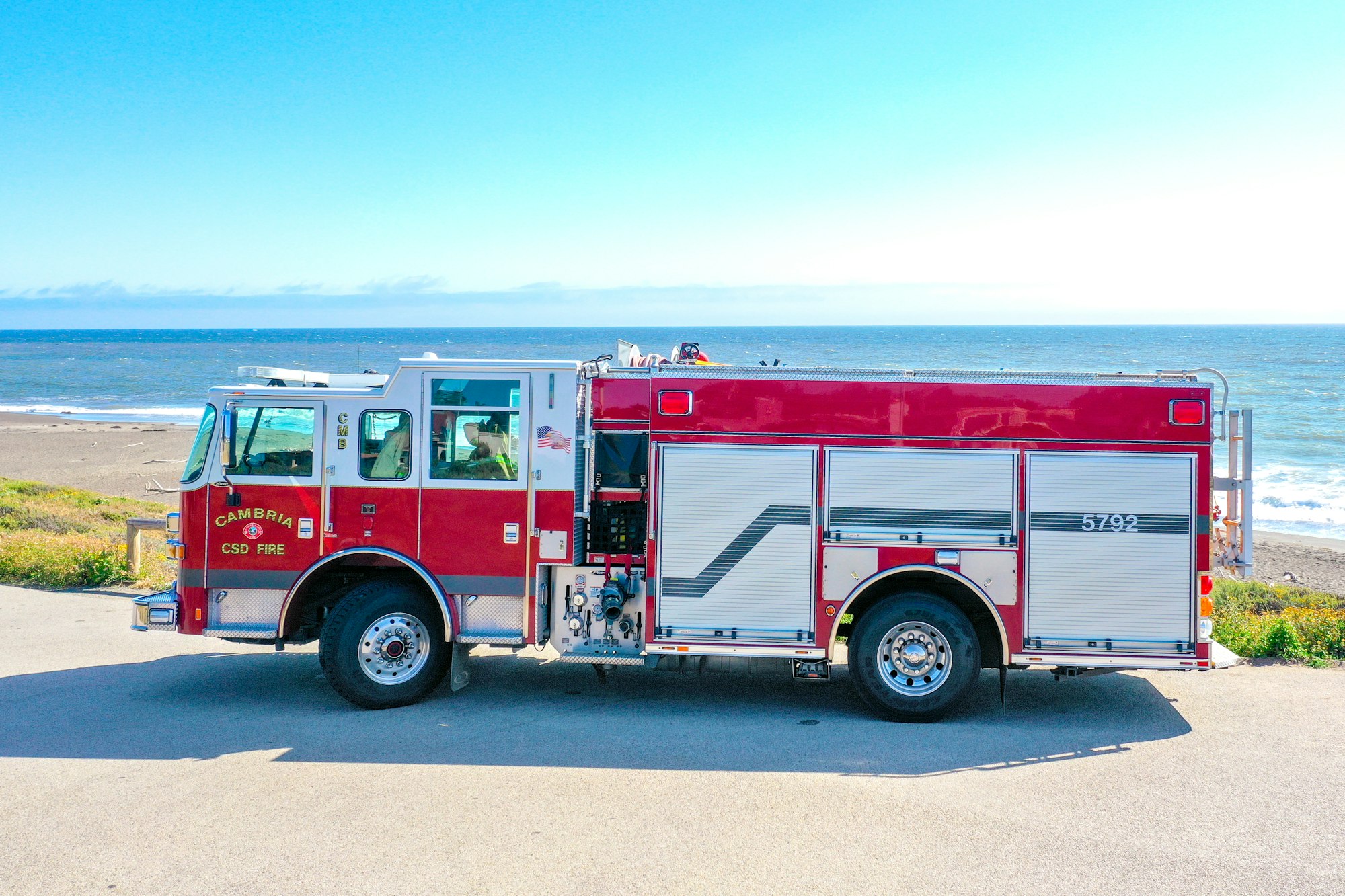 May contain: transportation, vehicle, truck, machine, wheel, fire truck, fire station, and person
