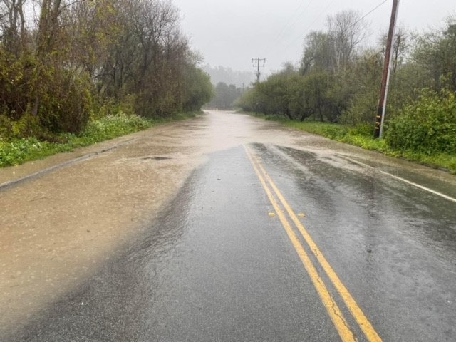 May contain: road and rain