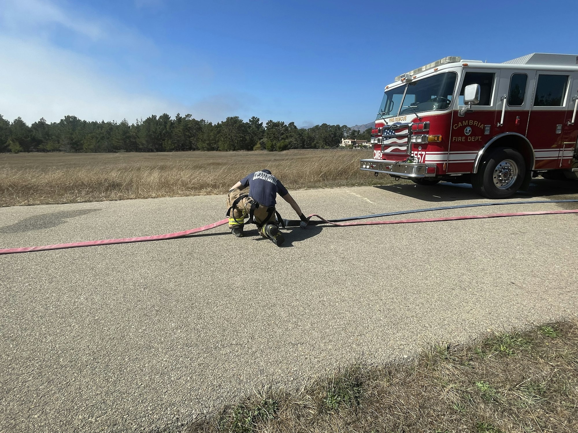 May contain: truck, vehicle, transportation, person, human, and fire truck