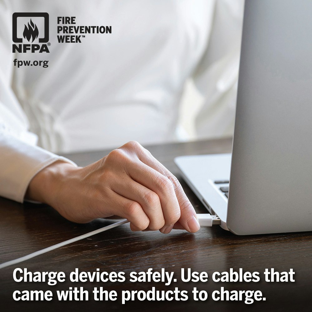 A person plugging a cable into a laptop with a safety message about using original charging cables.