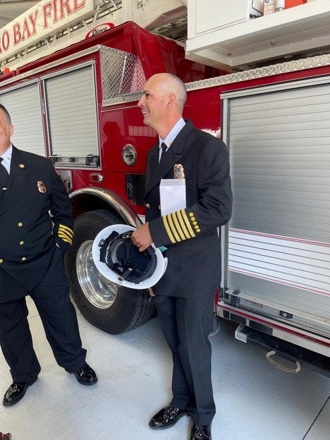 May contain: person, human, wheel, machine, truck, vehicle, transportation, shoe, clothing, footwear, apparel, and fire truck