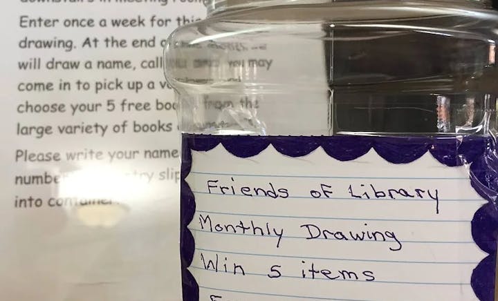 photo of raffle jar and text