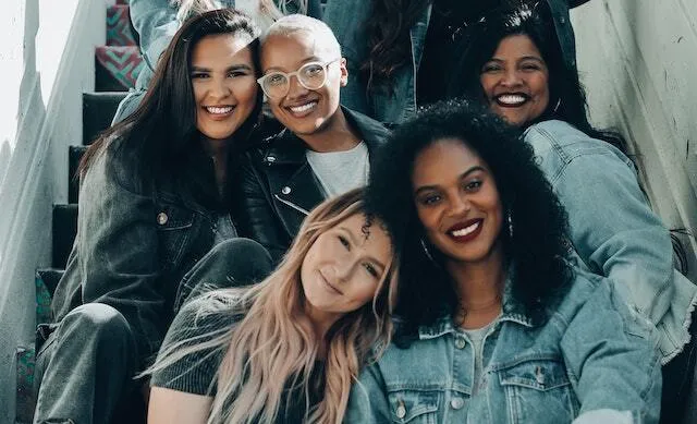 May contain: face, happy, head, person, smile, laughing, groupshot, adult, female, and woman