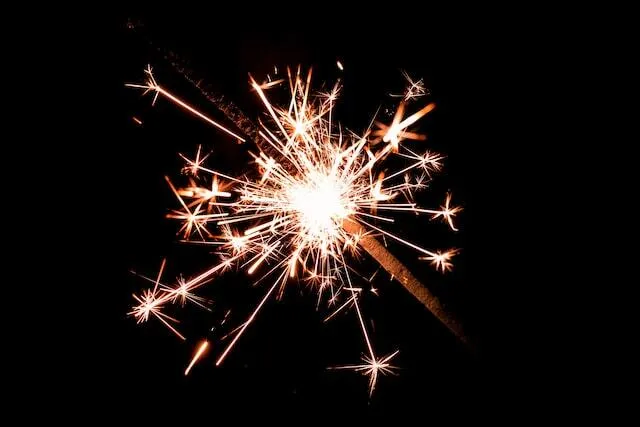May contain: fireworks, nature, night, outdoors, chandelier, and lamp