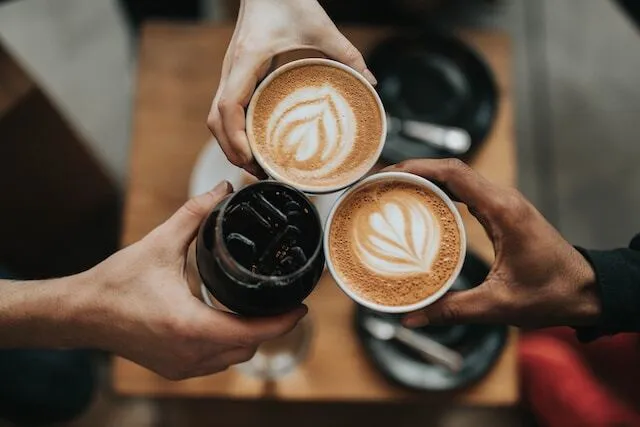 May contain: beverage, coffee, coffee cup, and latte art