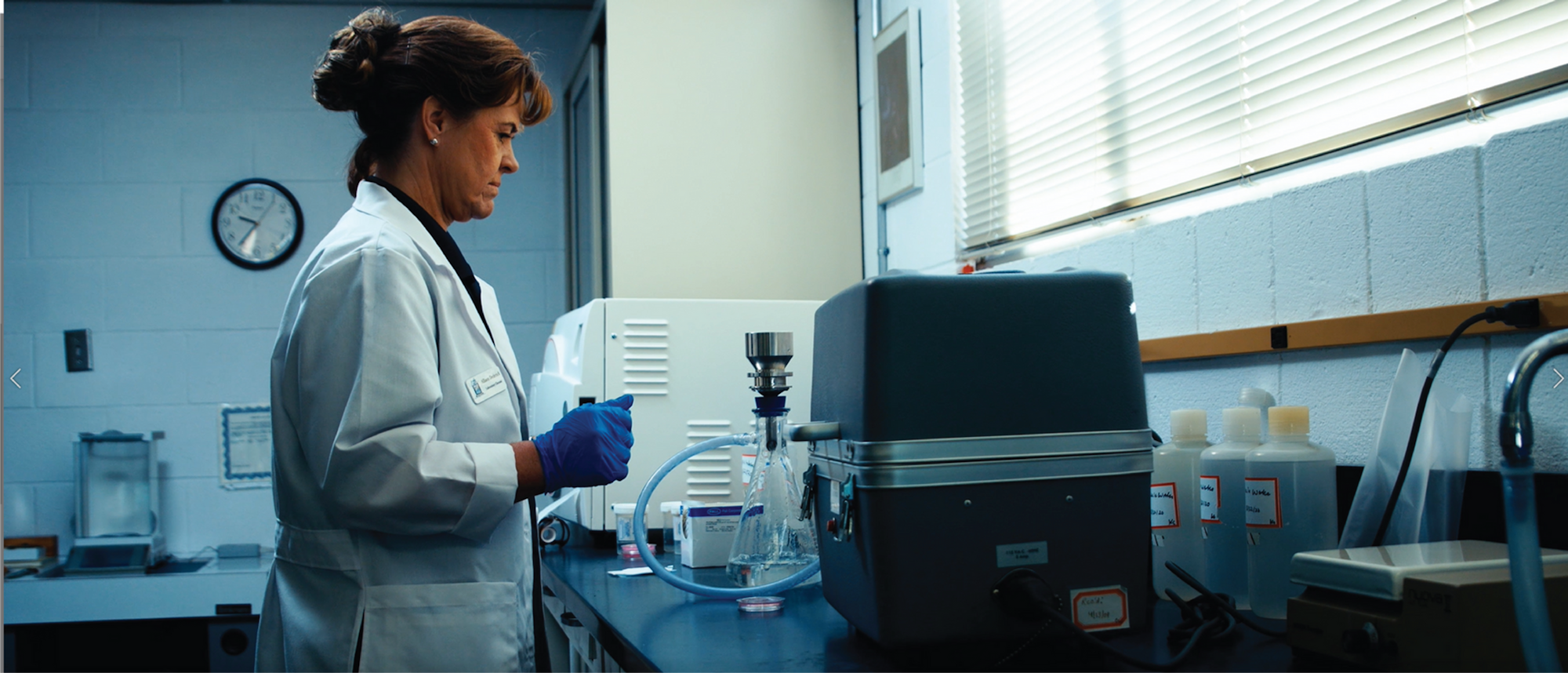 Scientist working with laboratory equipment.