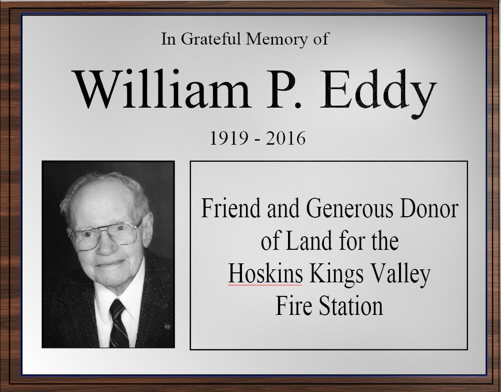The image is a memorial plaque for William P. Eddy (1919-2016), honoring him as a generous land donor for a fire station.