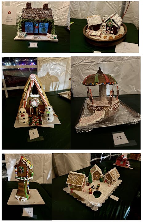 Five gingerbread house displays with various decorations and numbers, showcased at an event.