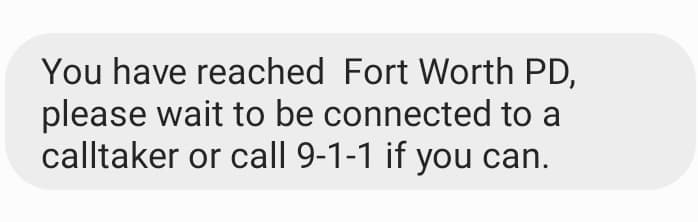 A text message from a police department, advising the recipient to wait or call 911.