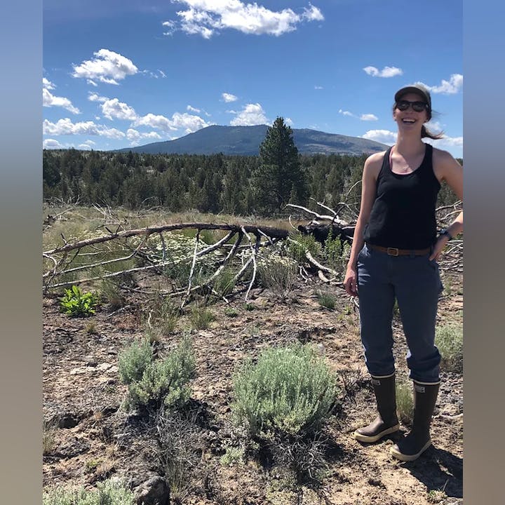 May contain: person, human, clothing, apparel, plant, tree, wilderness, nature, outdoors, ground, vegetation, pants, sunglasses, accessories, accessory, fir, abies, soil, woodland, land, and forest