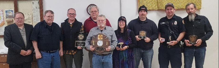 May contain: people, person, clothing, pants, adult, male, man, groupshot, accessories, glasses, and jeans