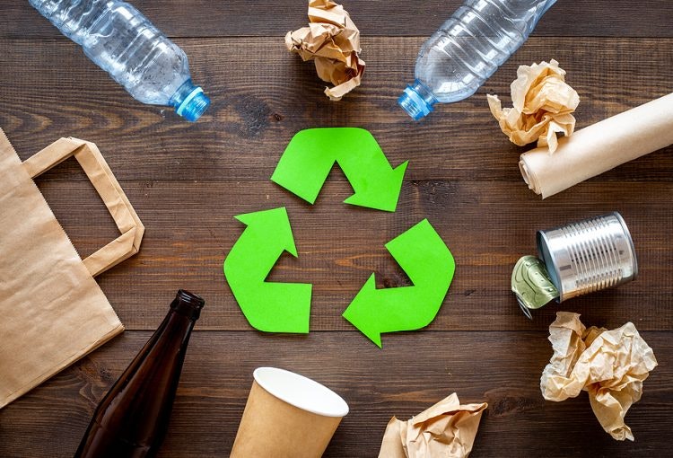 May contain: recycling symbol and symbol, empty water bottle, Cans, bags, paper