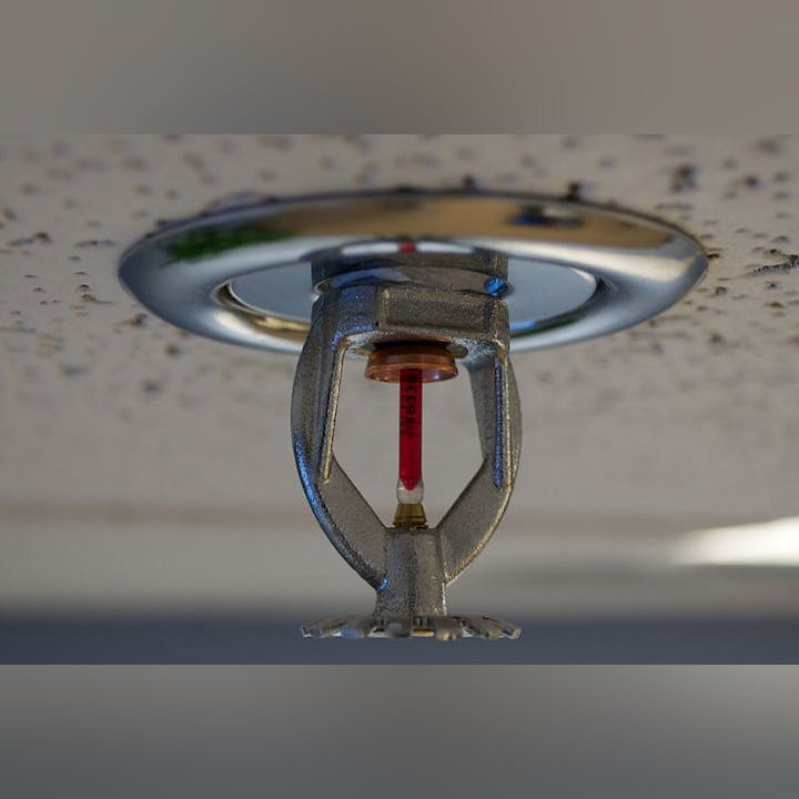 May contain: water, machine, and sprinkler