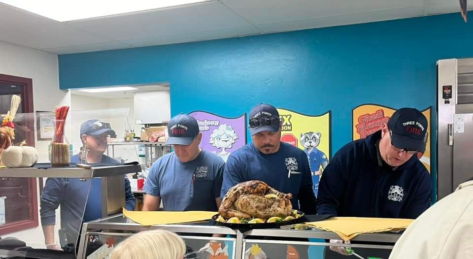 May contain: cafeteria, indoors, restaurant, baseball cap, cap, clothing, hat, food, lunch, meal, person, adult, male, man, and people