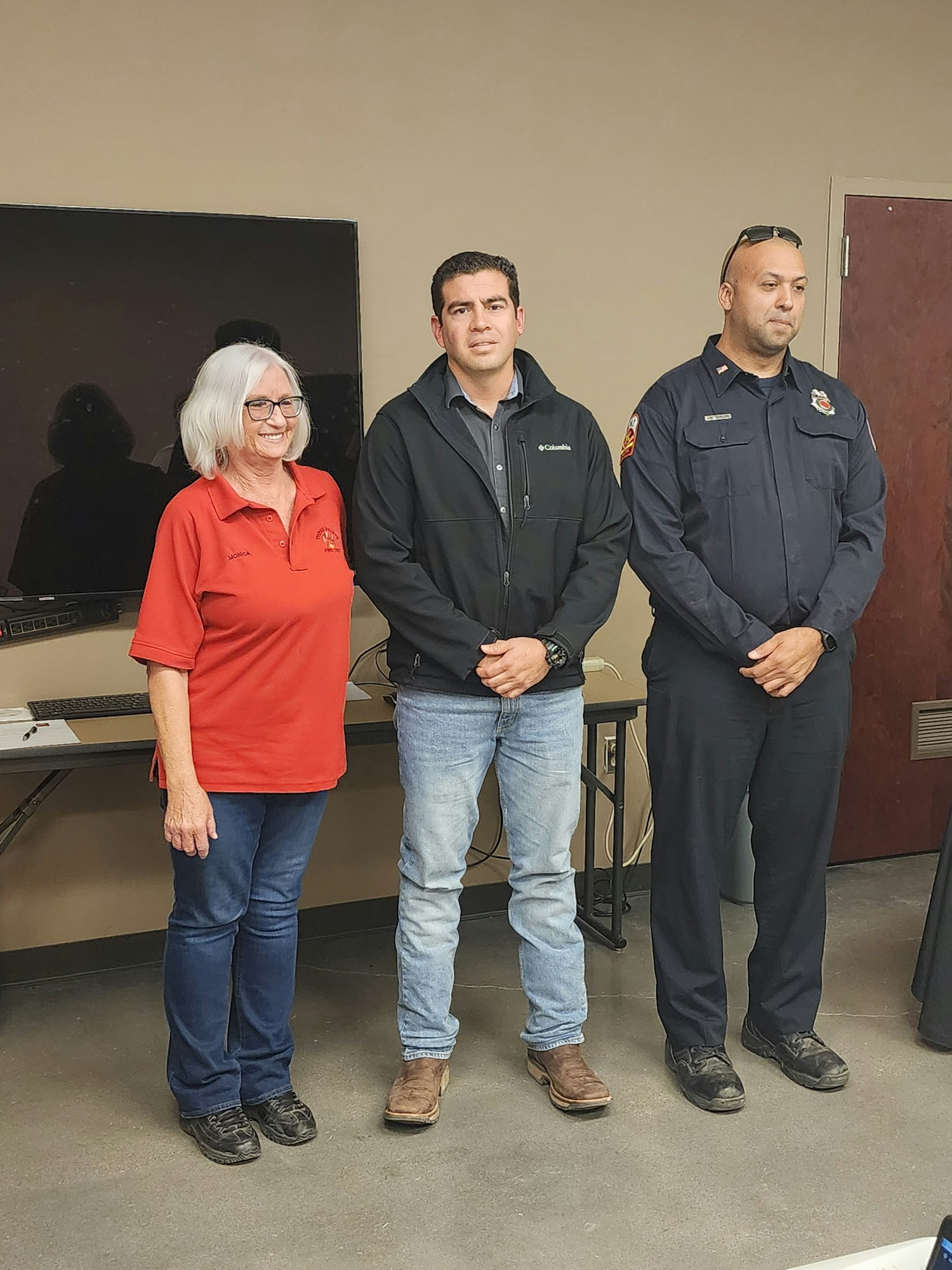 May contain: clothing, pants, footwear, shoe, person, adult, male, man, female, woman, jeans, coat, jacket, groupshot, computer, computer hardware, computer keyboard, electronics, and hardware