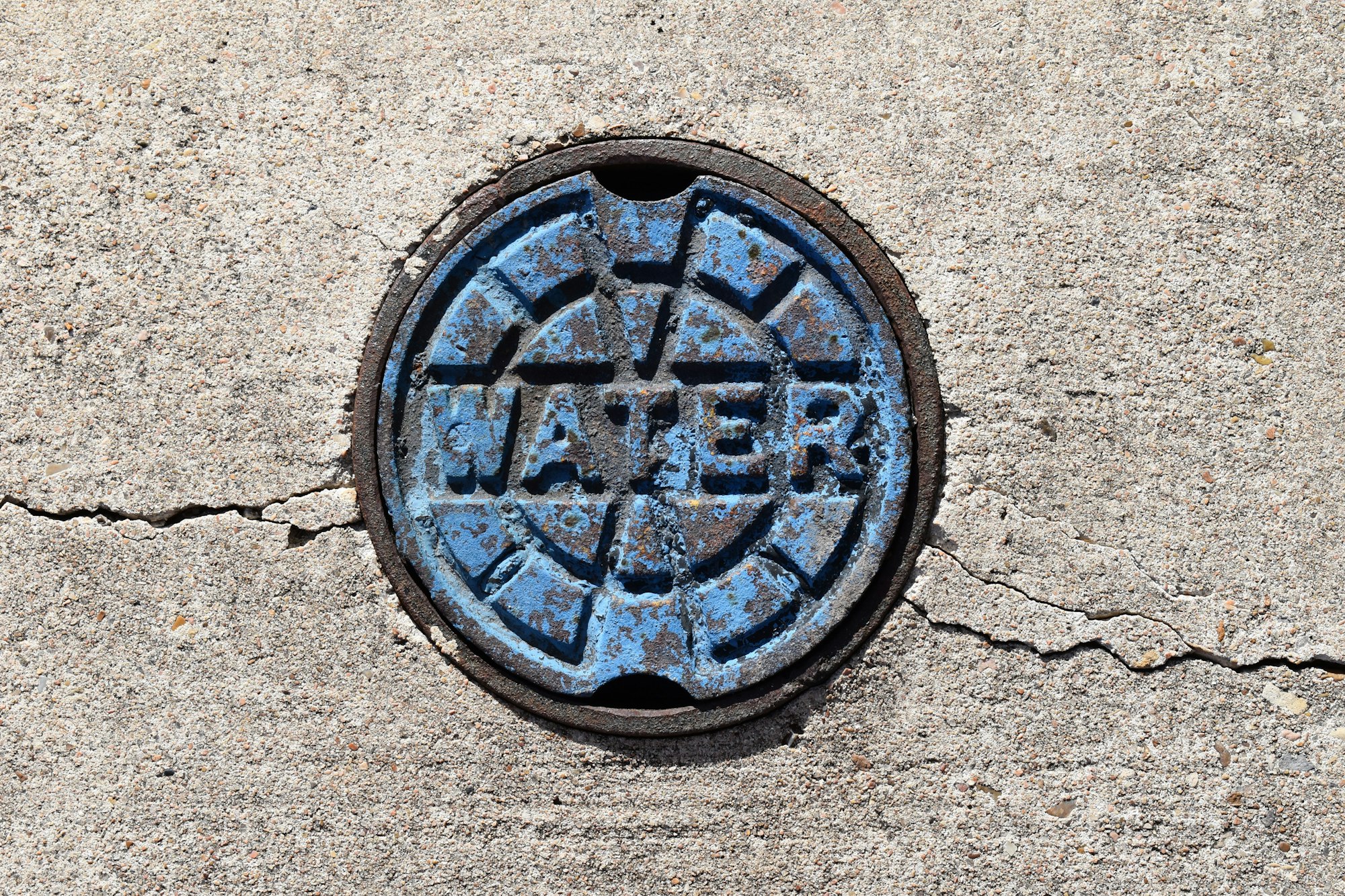 May contain: hole, wheel, machine, manhole, drain, and sewer