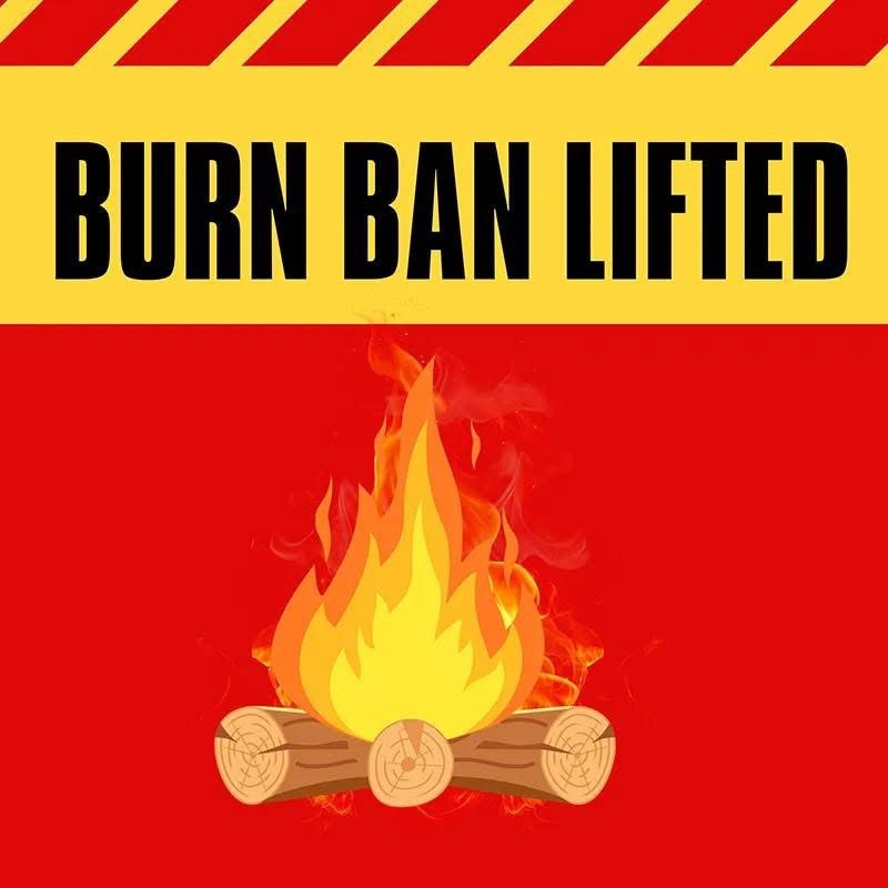 "Burn Ban Lifted" text with a campfire illustration on a red background.