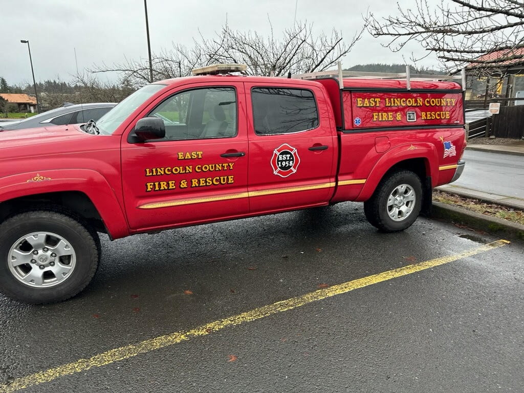 Red fire and rescue truck labeled "East Lincoln County Fire & Rescue" with "EST 1958."