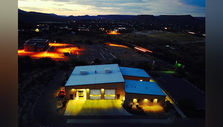Aerial view of a fire station at night