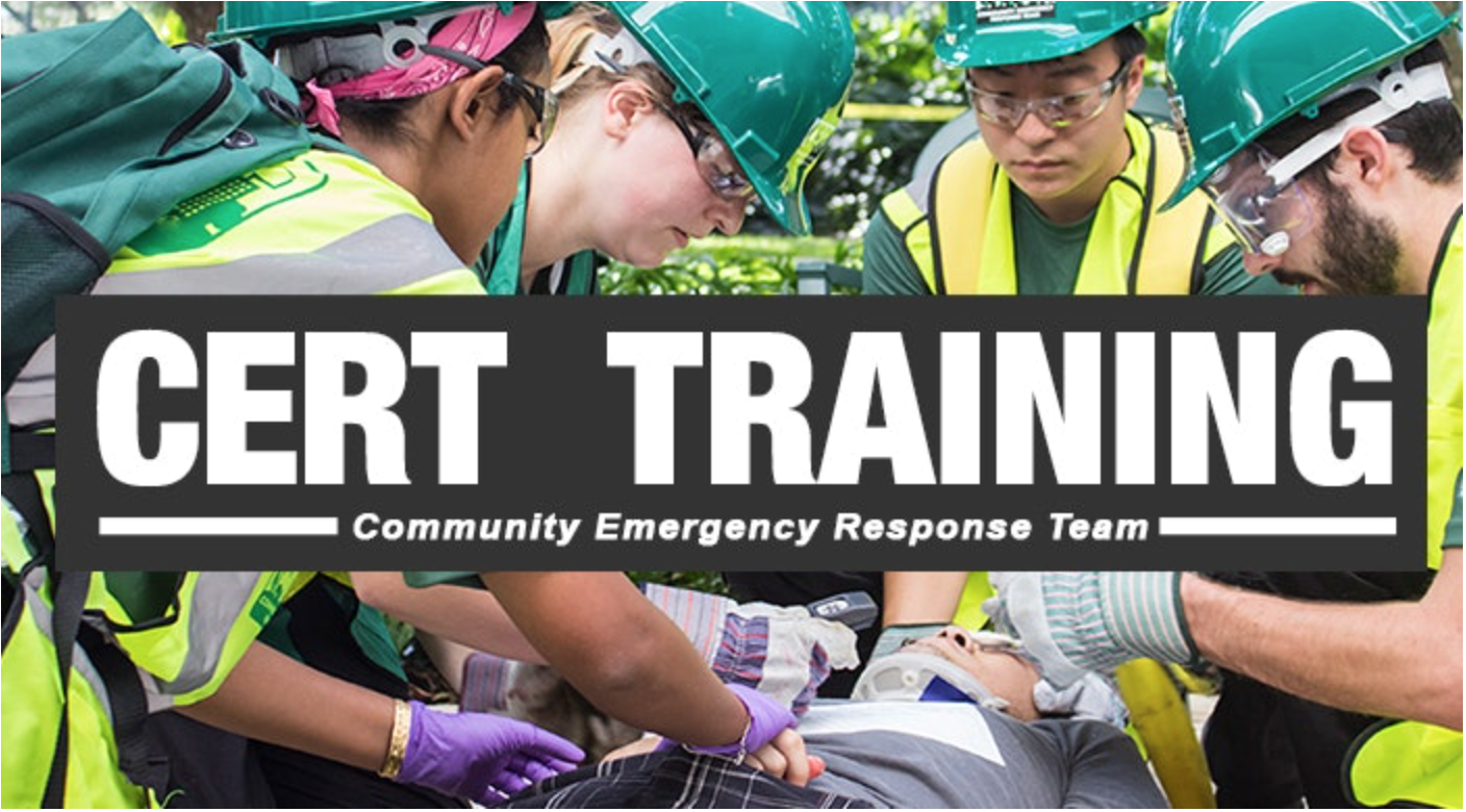 People in green safety hard hats and yellow safety vests practicing medical with a person on a backboard, with "CERT TRAINING" text overlay.