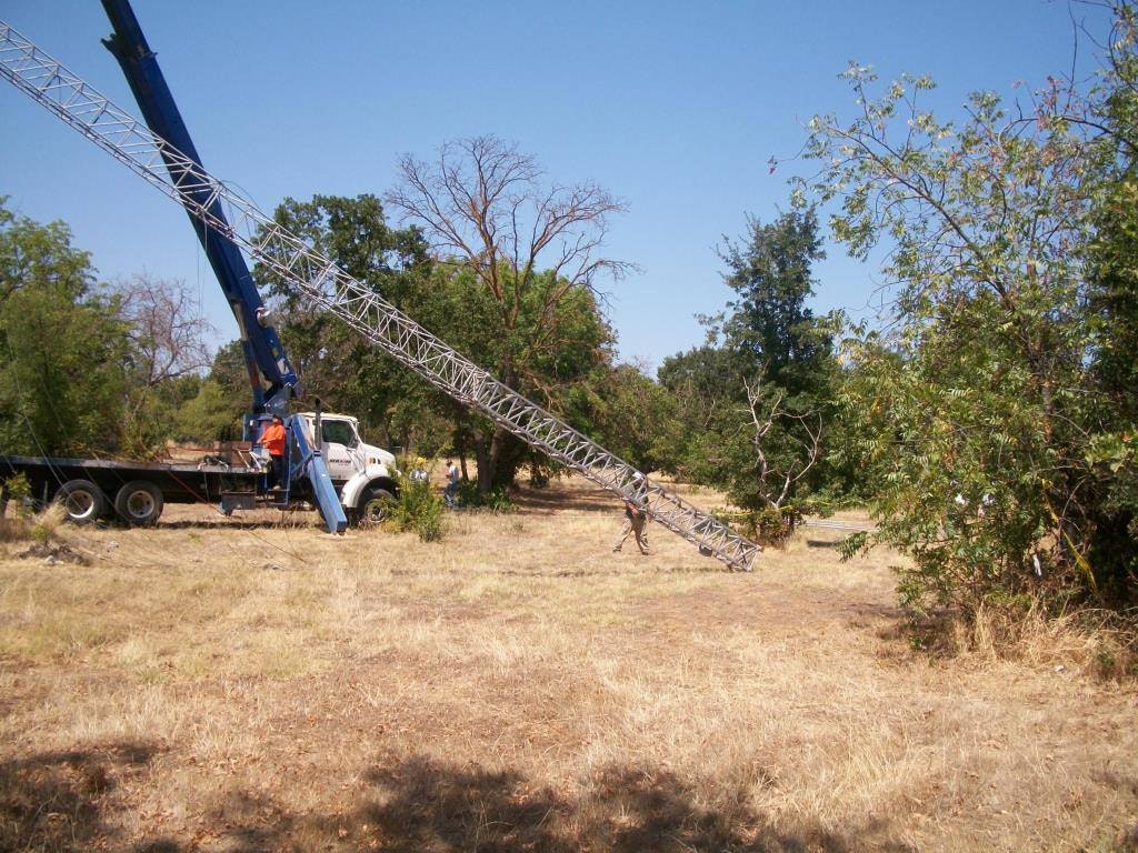 EDCARC using a crane to raise an antenna tower