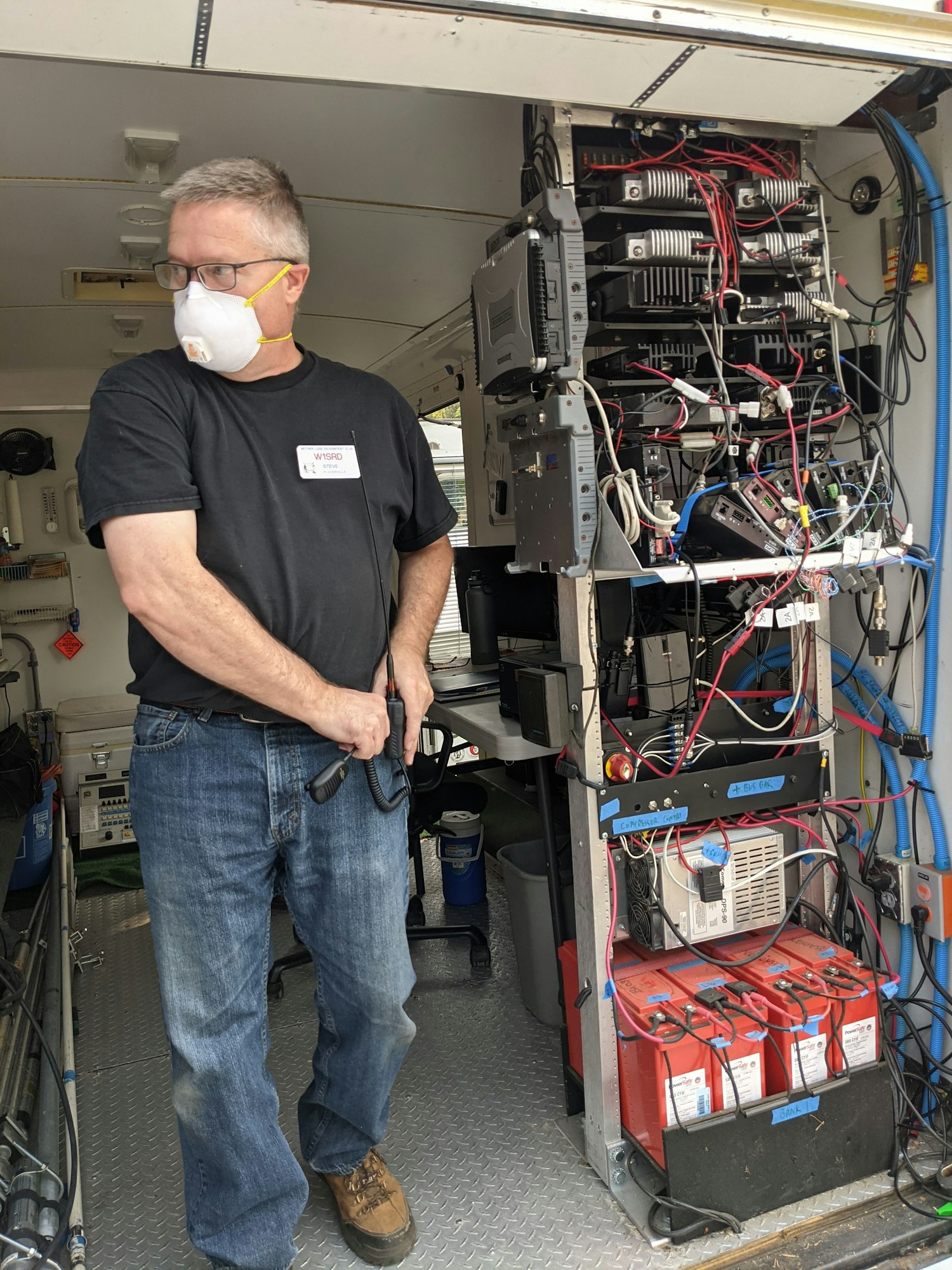 Steve Dyer W1SRD with EDCARC ARES prepares for his Net Control shift in EDCARC ARES trailer