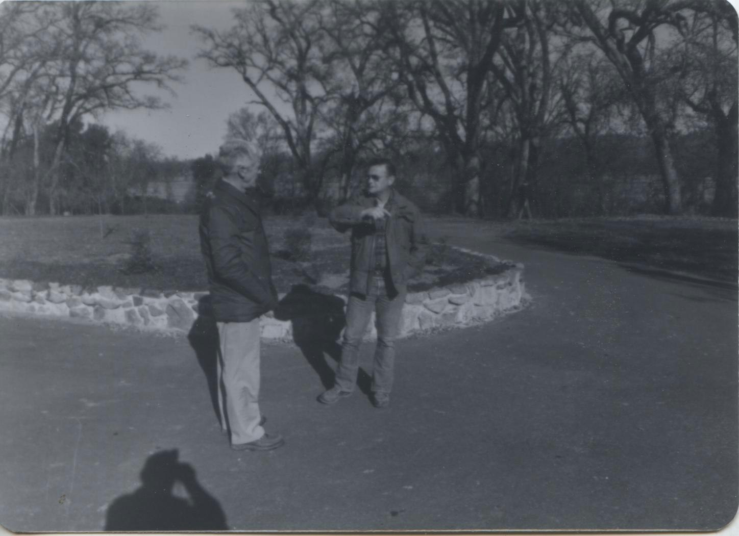 Two men standing near the park's entrance, circa 1975.