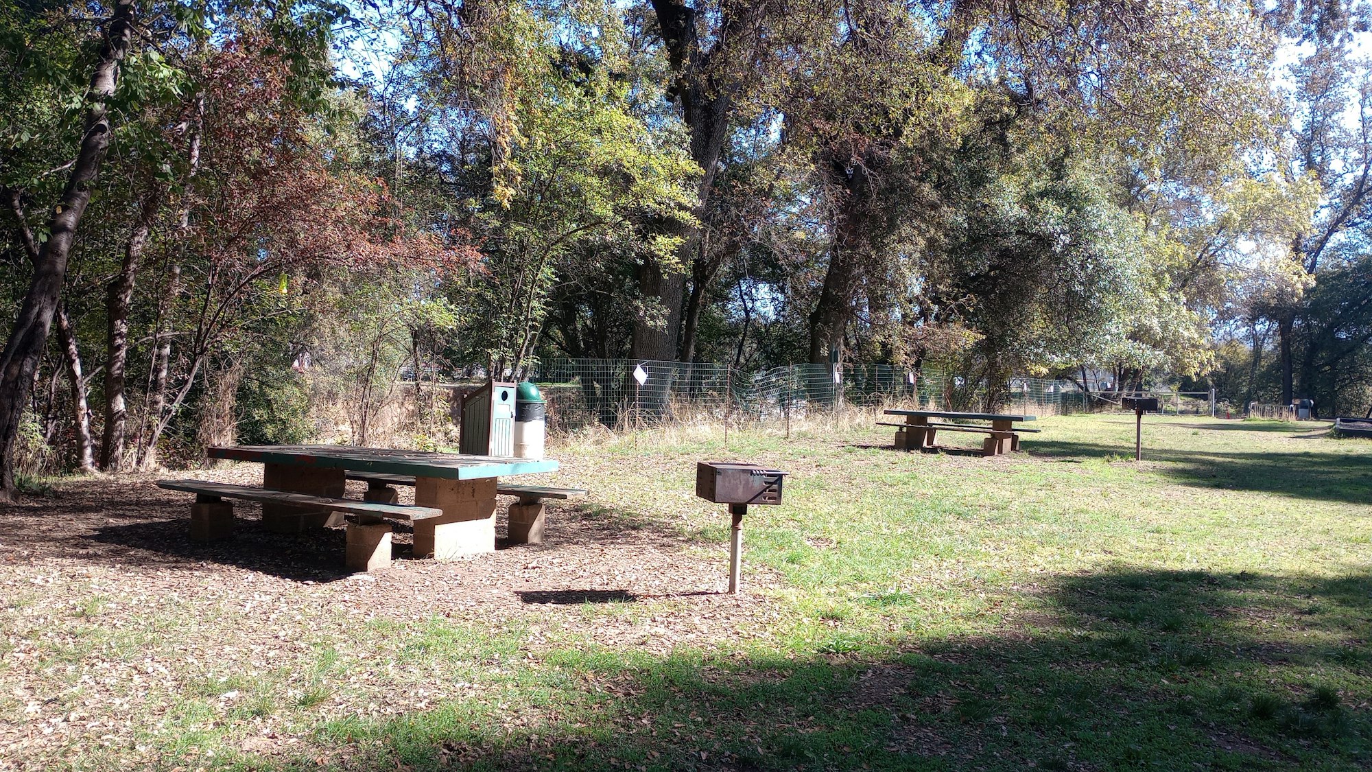 Picnic tables and a grills at Picnic Area 6B.