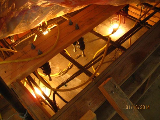 Wooden beams and cables with construction lighting, likely indicating an under-construction or repair area.