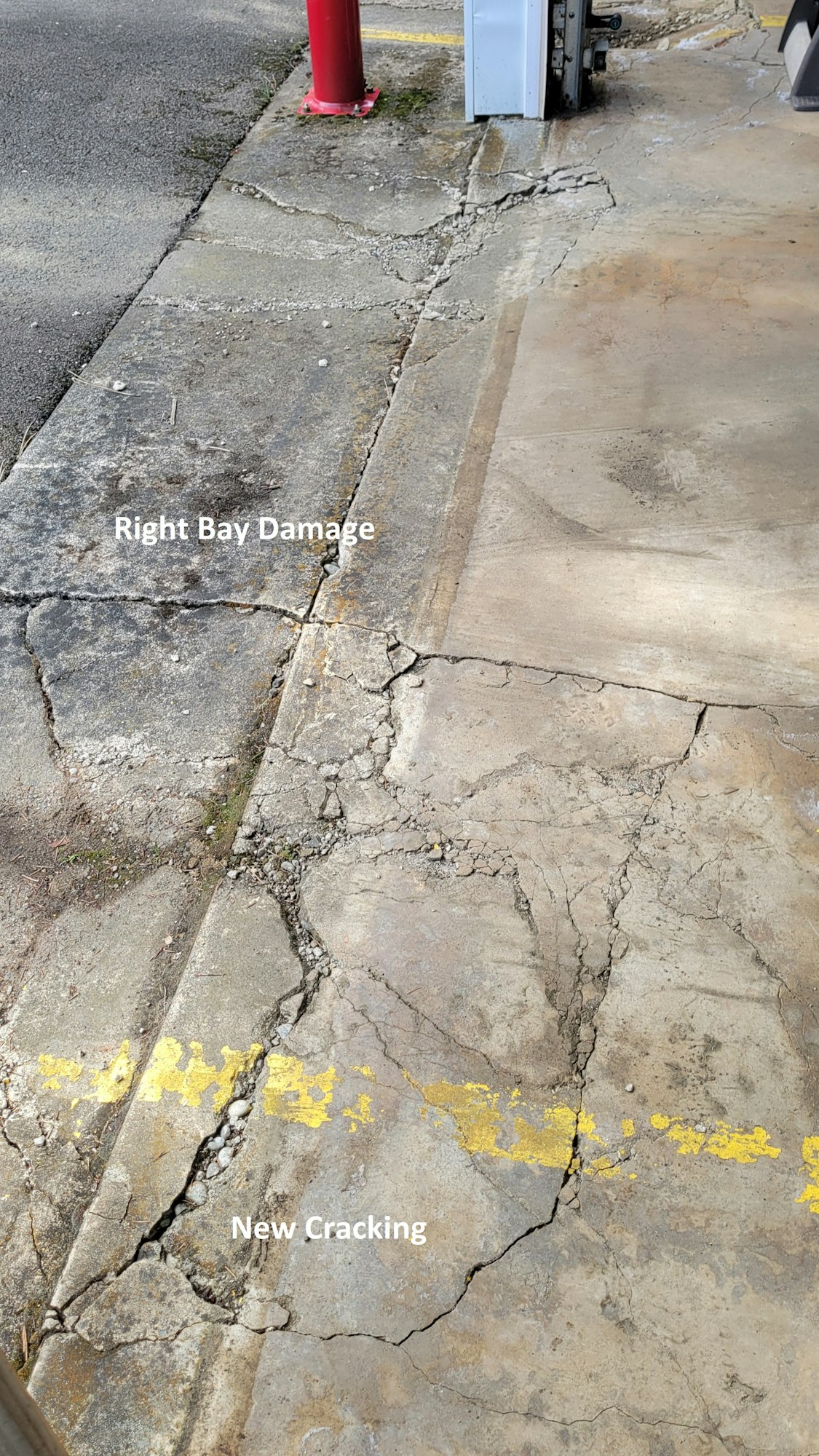 Cracked pavement labeled "Right Bay Damage" and "New Cracking" near a red pole and utility box.