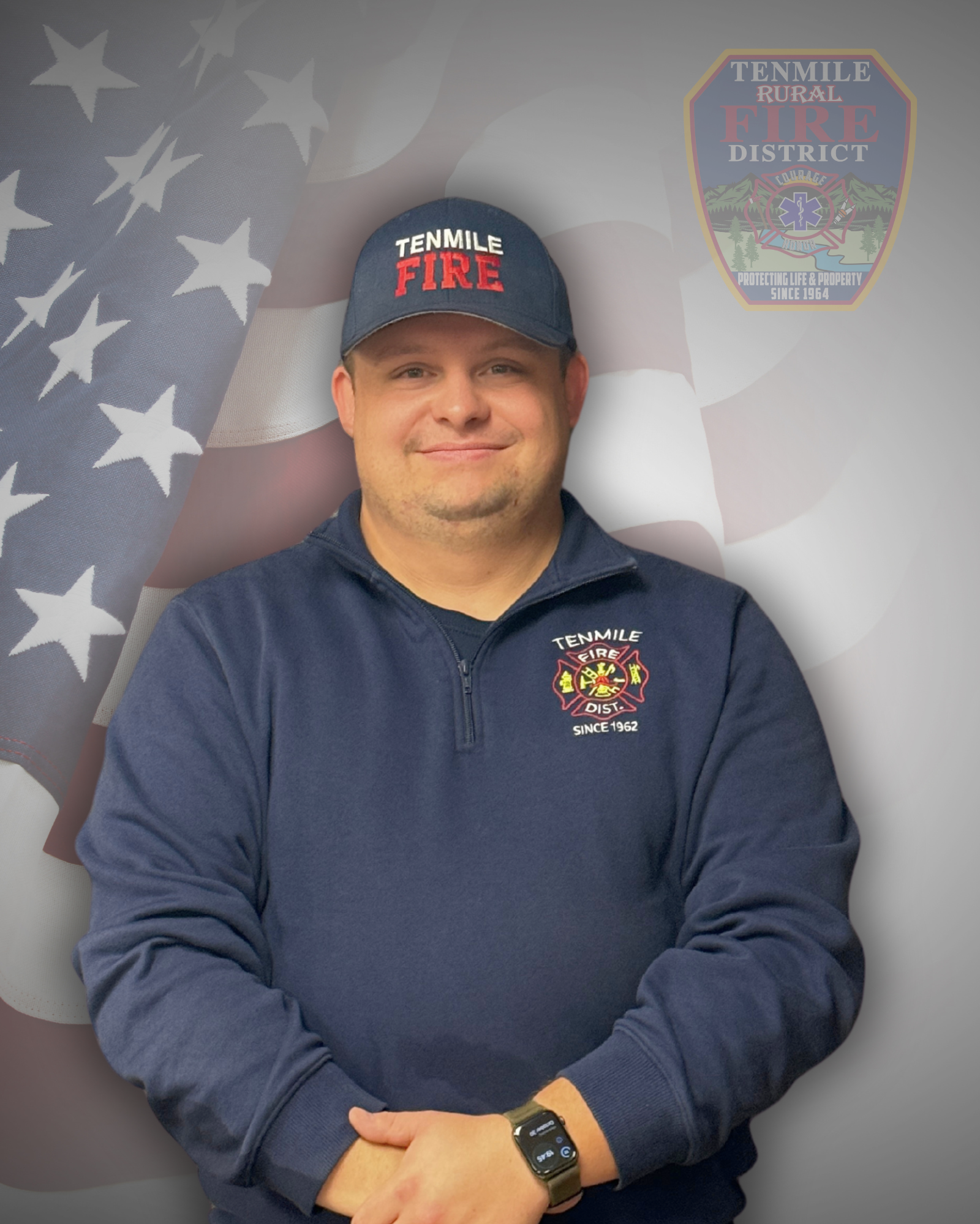 Man in a Tenmile Fire Dept. uniform with an American flag background.