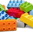 Colorful plastic building blocks stacked together.