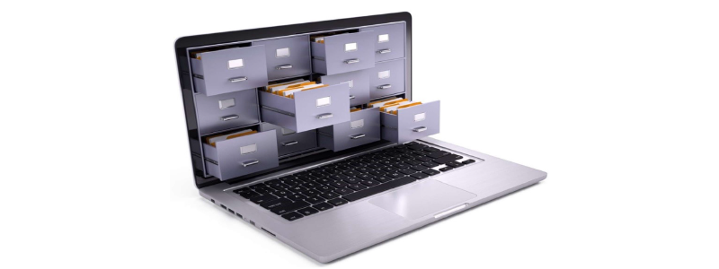 A laptop with file cabinet drawers emerging from the screen, symbolizing digital organization or data storage.