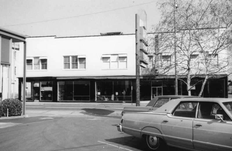 May contain: city, road, street, urban, person, car, transportation, vehicle, and neighborhood