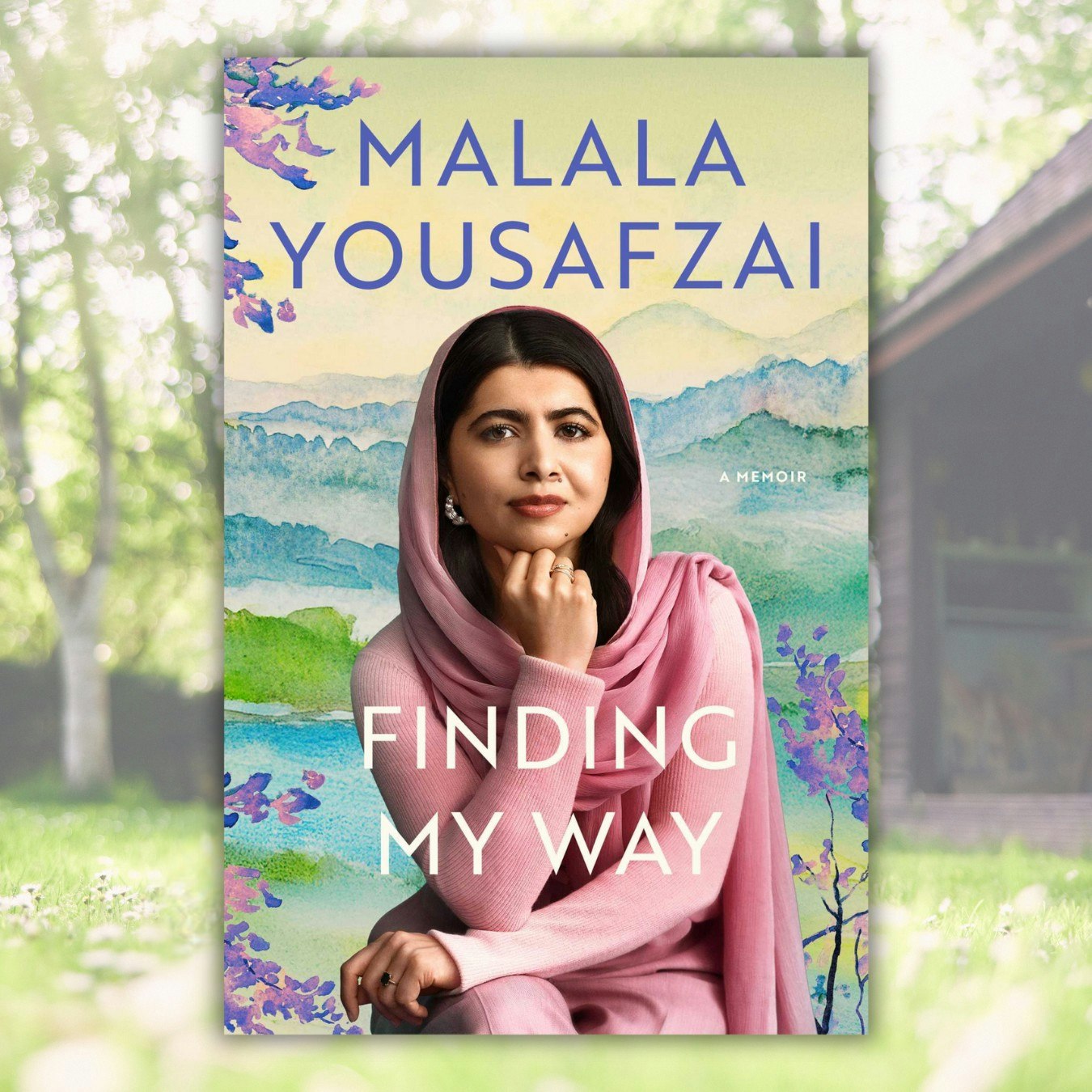 Book cover: "Finding My Way" by Malala Yousafzai, featuring an image of her in a pink outfit.