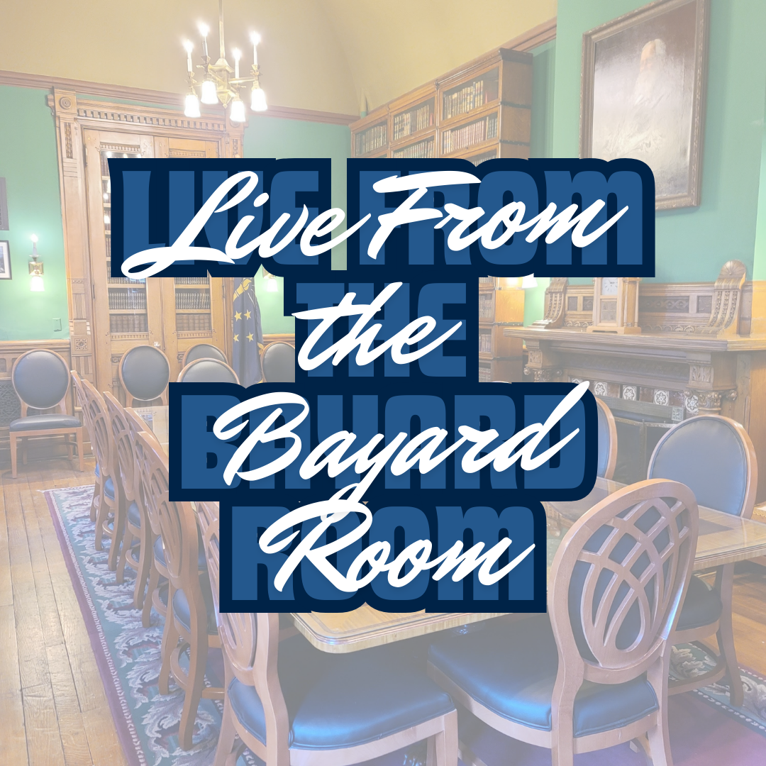 Elegant room with chairs, tables, bookshelves, and "Live From the Bayard Room" text overlay.