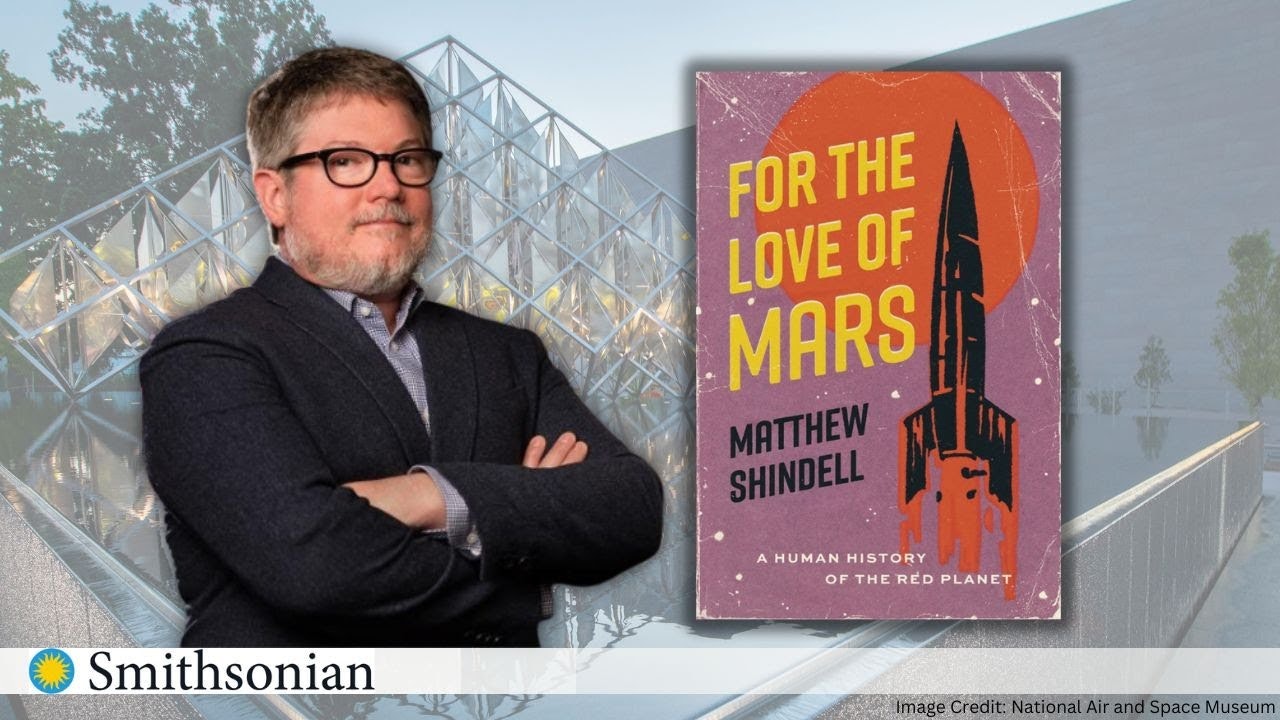 Man beside a book titled "For the Love of Mars" with a rocket on the cover, over a Smithsonian watermark.