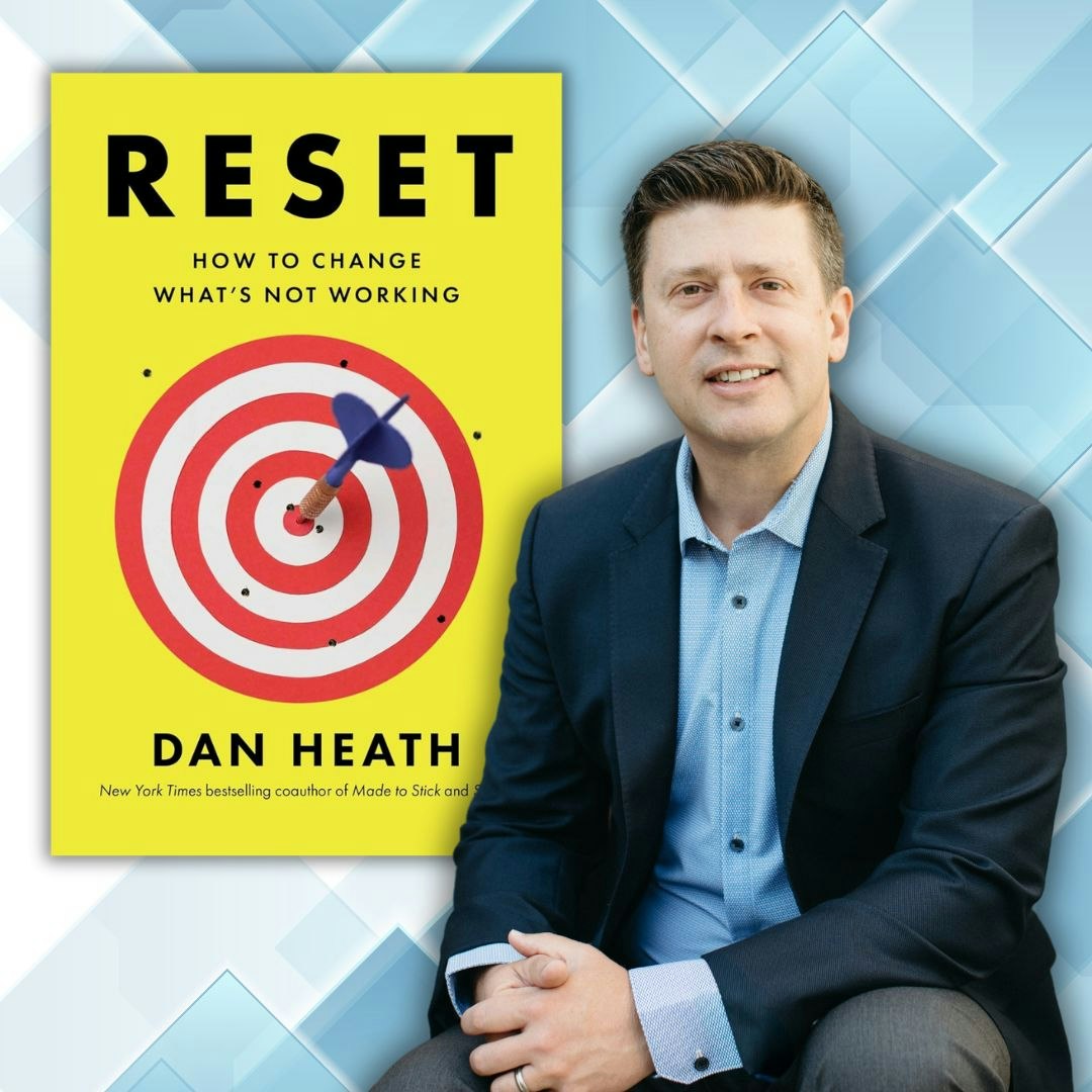 A book cover titled "RESET" with a bullseye design, alongside a person in a suit.